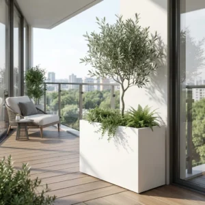 Biała metalowa donica prostokątna do ogrodu z oliwką na nowoczesnym tarasie