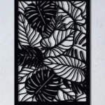 Dekoracja ścienna metalowa Tropical Leaves – czarna, przedstawiająca egzotyczne liście monstery i roślin tropikalnych.
