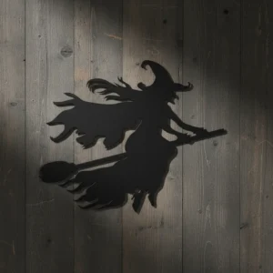 Metalowa dekoracja czarownica lecąca na miotle – ozdoba na Halloween