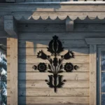 metalowa dekoracja ścienna z motywem kwiatów w stylu góralskim, czarna stal wycinana laserowo