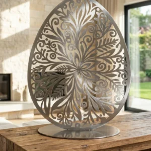 Metalowe jajo dekoracyjne Wiosenna Mandala – stalowa ażurowa rzeźba na podstawie